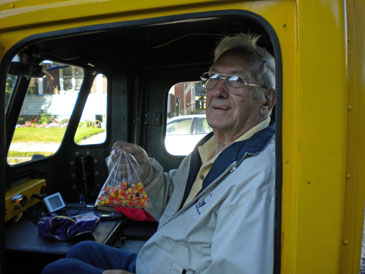 Harvey Page seated at the controls of Railcar 007