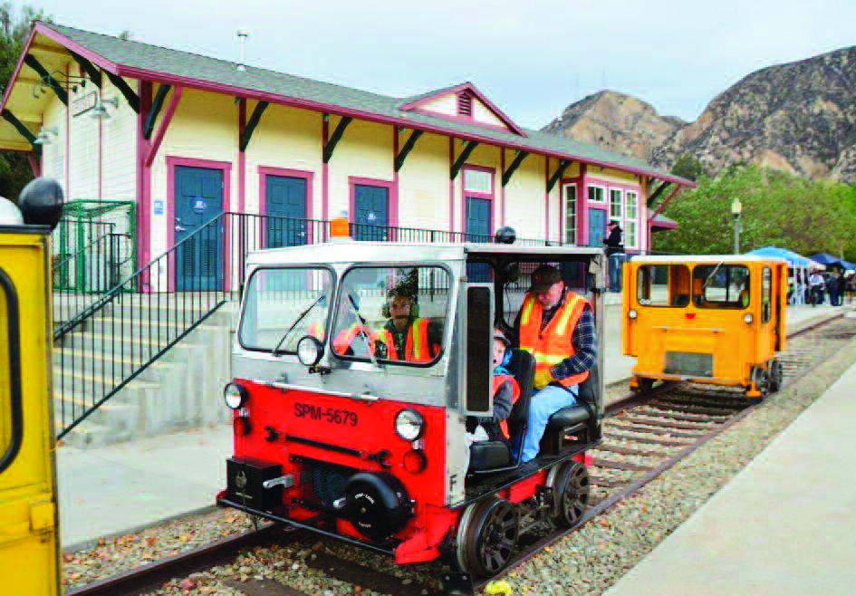 Railcars stopping at Piru Station on the Fillmore and Western Railway