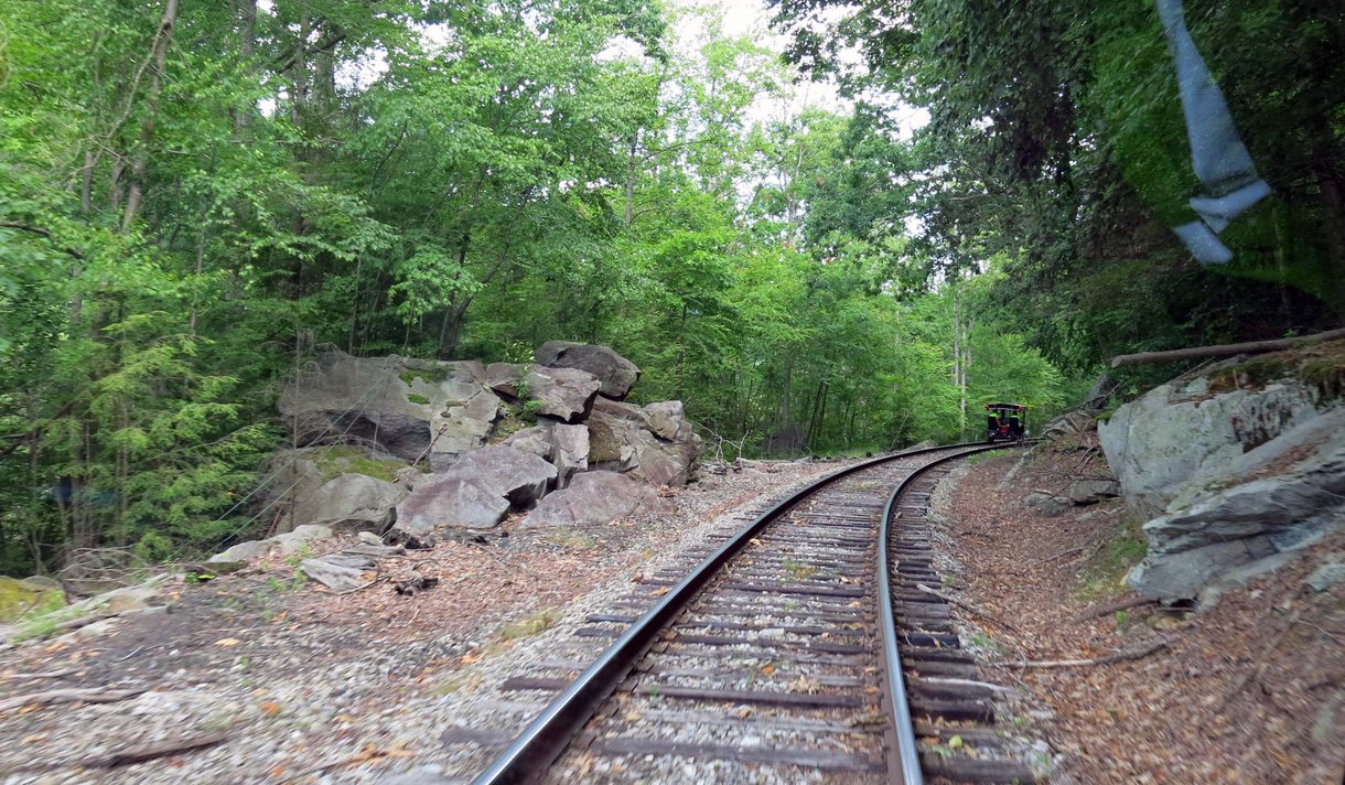 Following the Rinkers' railcar around a rocky curve