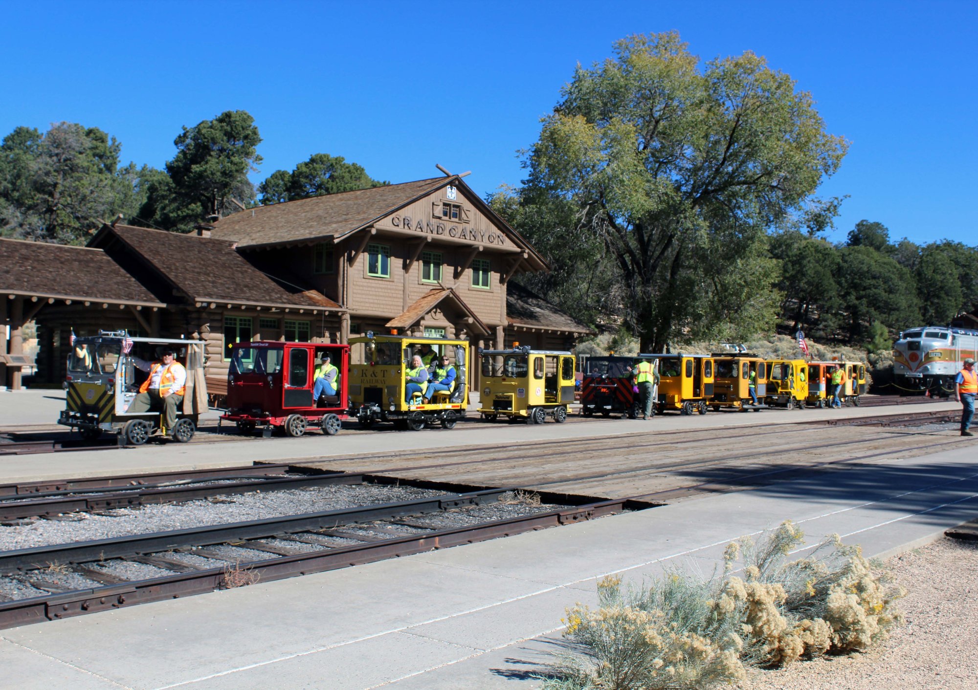 Excursion group lined up with their railcars at Grand Canyon Station